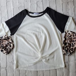 Miss Sparkle size medium top black white with leopard sleeves